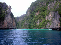 The sheltered bays of Koh Phi Phi Lay attract lots of boats