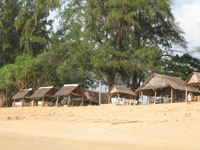 Rustic restaurants at the north end of Mai Khao Beach