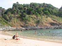 Yanui Beach is beautifully enclosed by tree-covered headlands