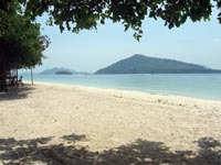 from the eastern beach of Koh Rang Yai, you look out to the bigger island of Koh Maprow